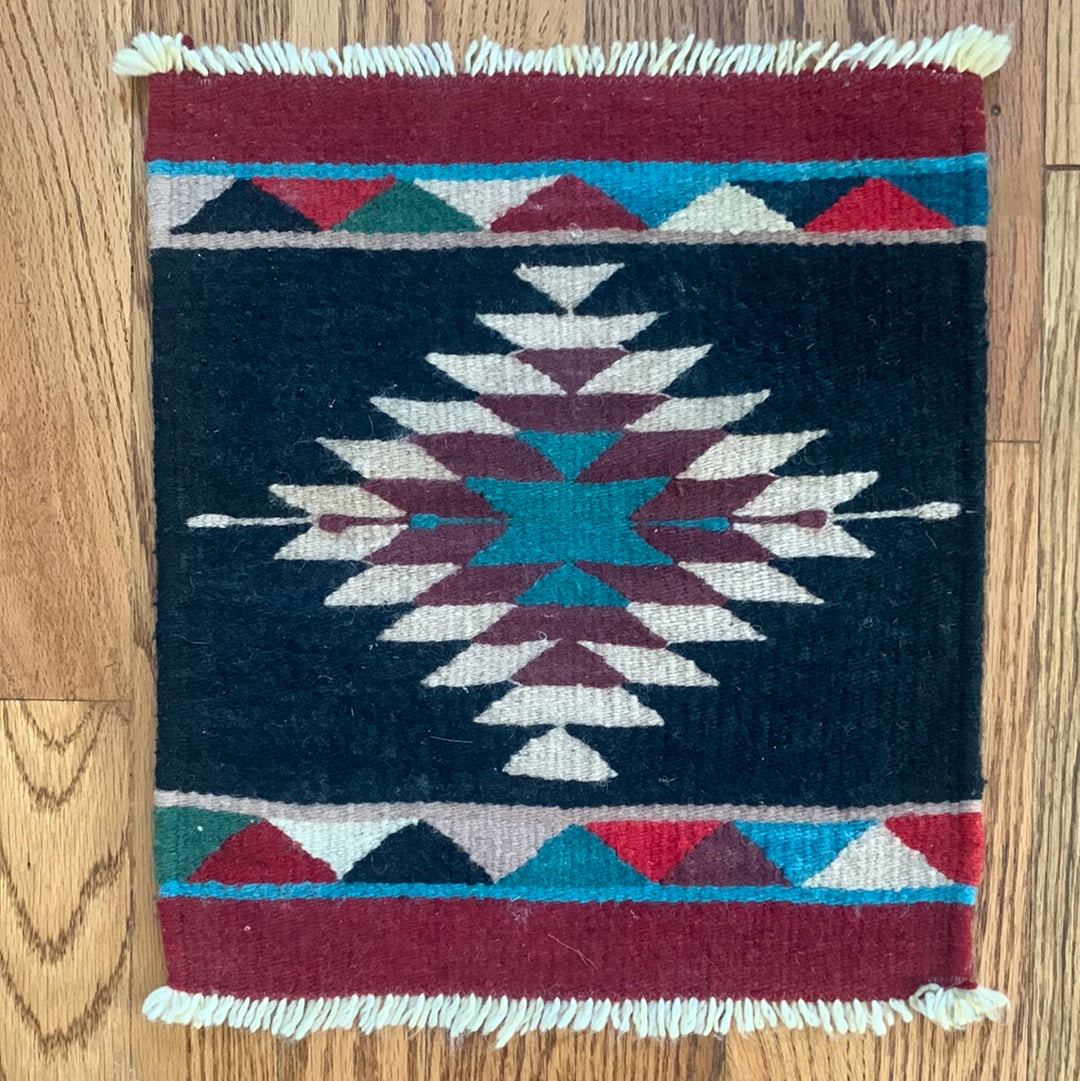 Burgundy, teal & black weaving