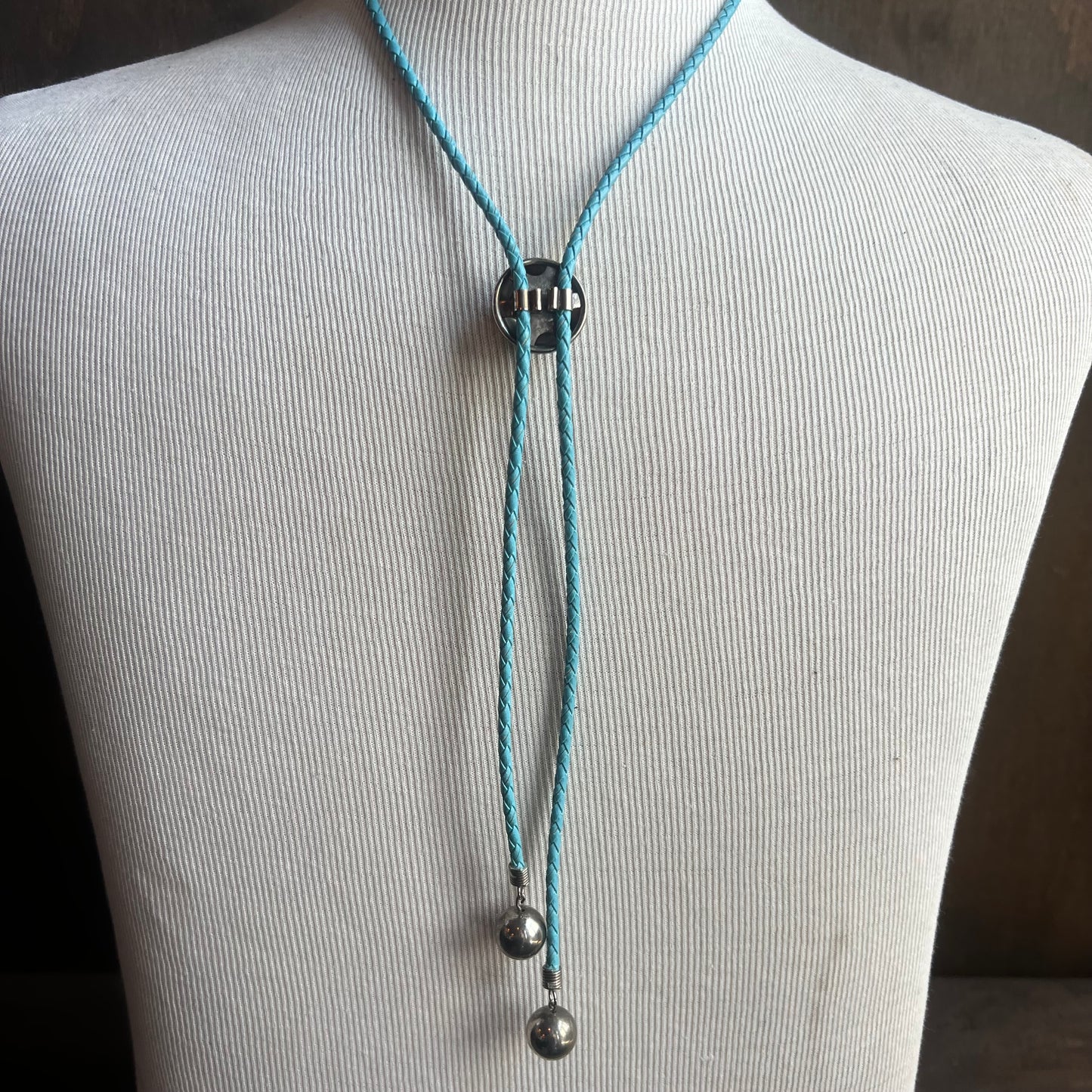 Silver Circle Bolo on Blue Cord