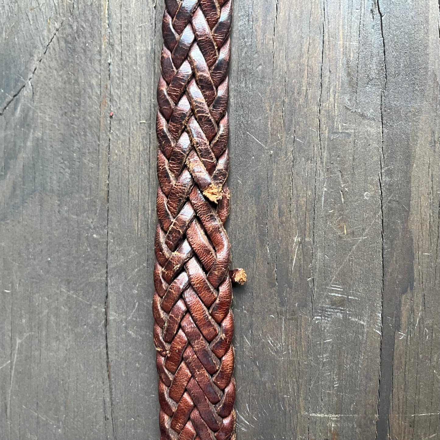 Brown braided belt with solid brass buckle