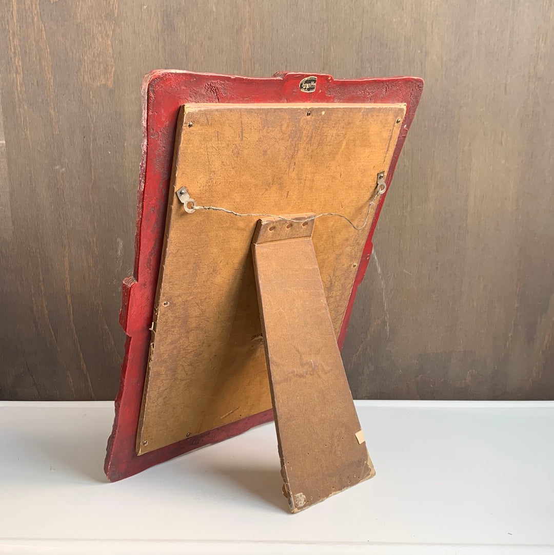 Vintage carved wood mirror with abstract shapes