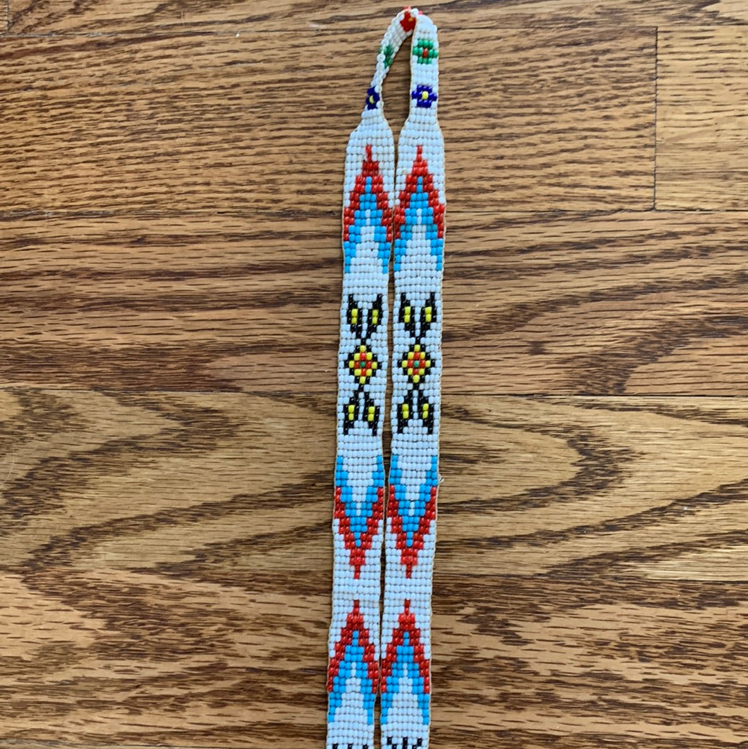 Multi-color beaded bird necklace with fringe