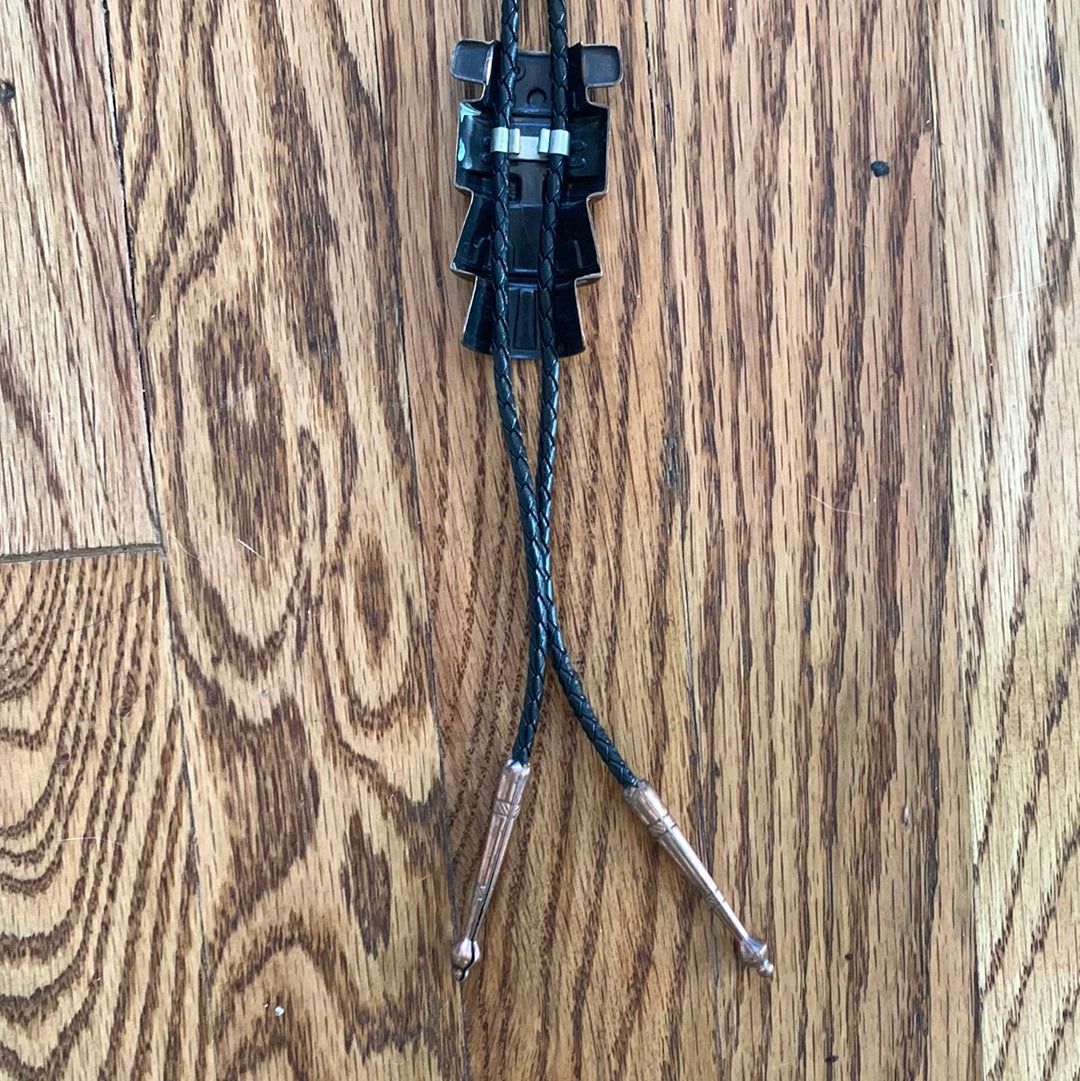 Metal Kachina bolo with black leather tie