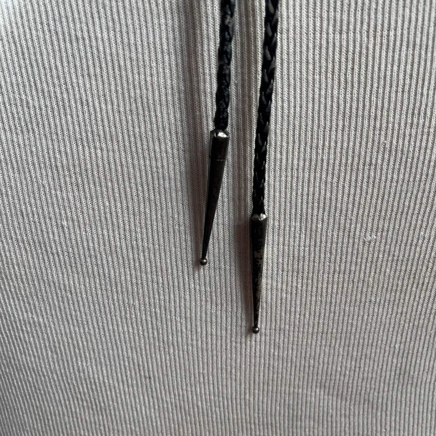 Sterling silver bear claw bolo with black tie