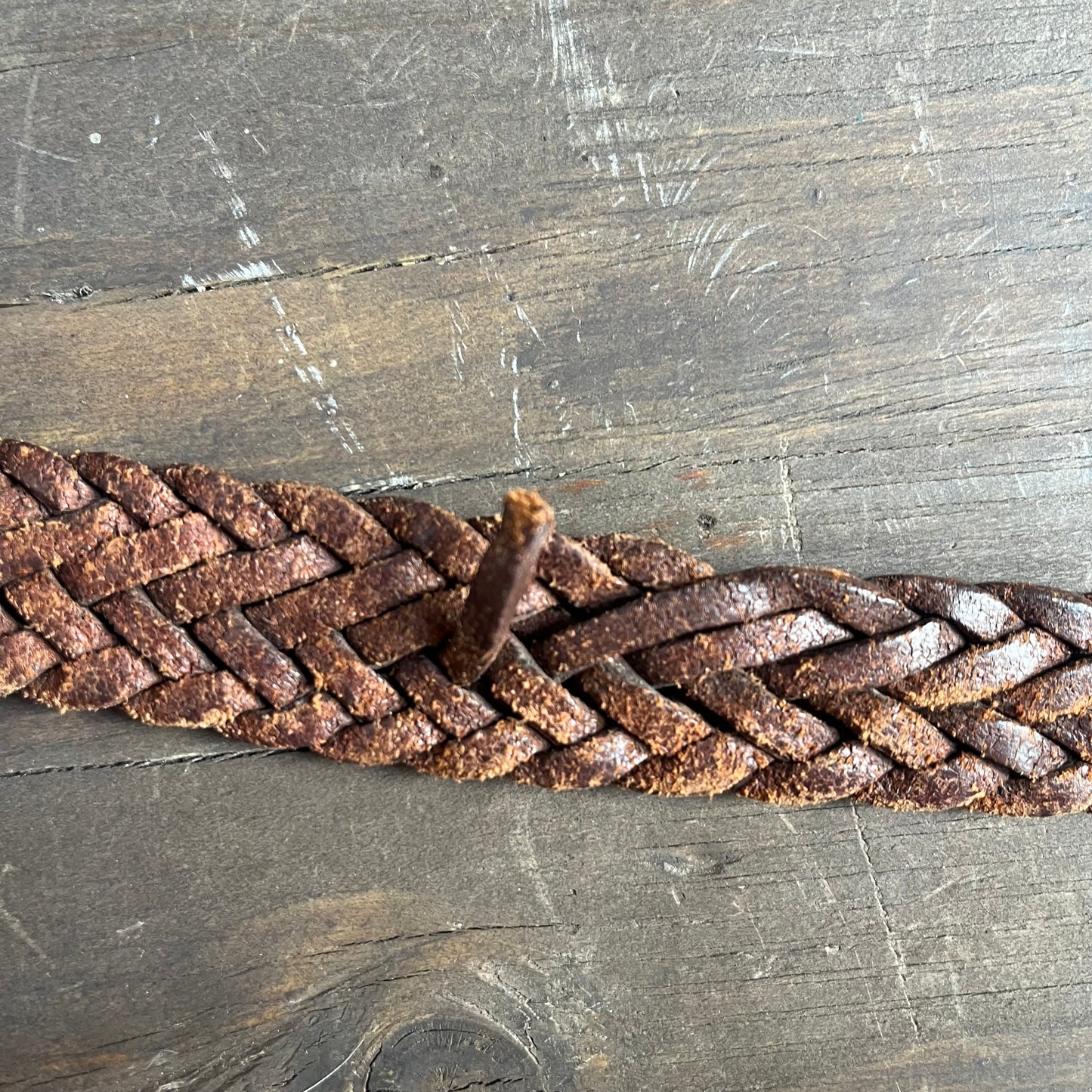 Brown braided belt with solid brass buckle