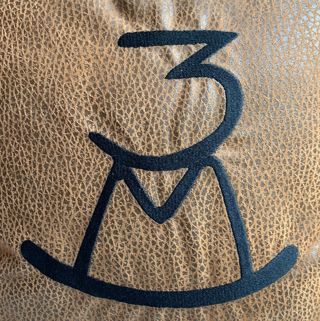 Light brown pillow with hat