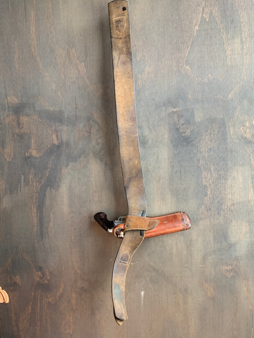 Wide black leather belt with holster (shown with water pistol)