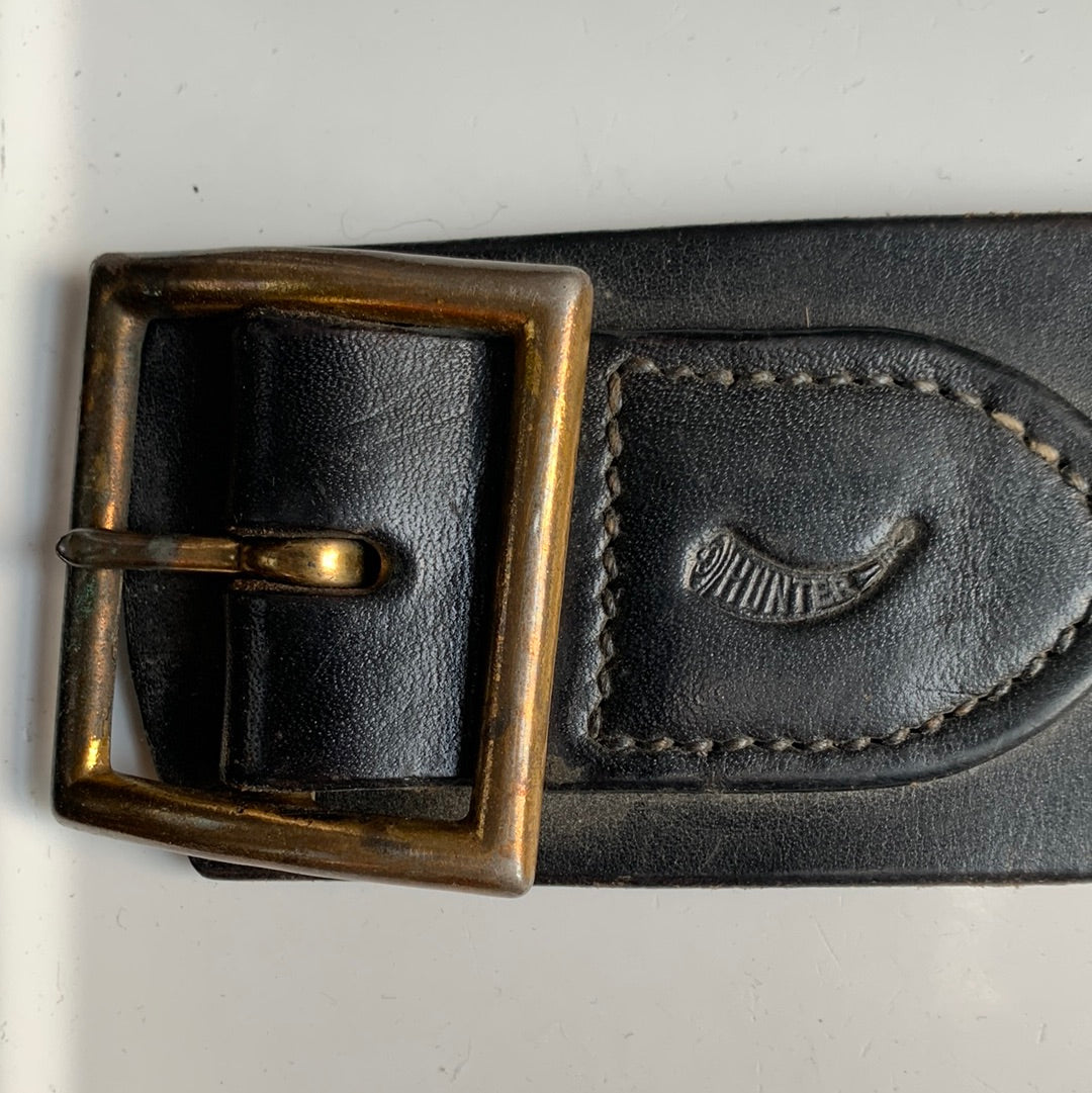Wide black leather belt with holster (shown with water pistol)