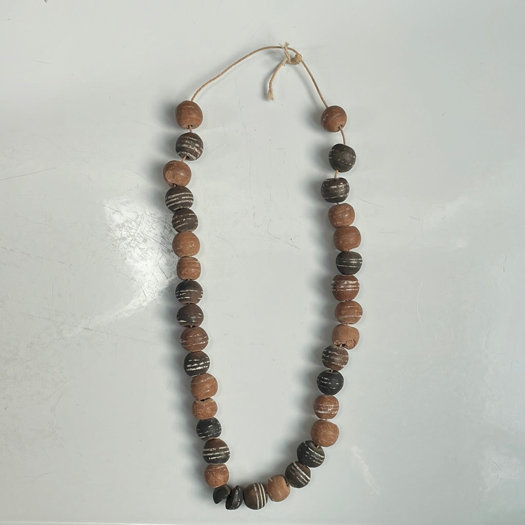 Clay bead strand necklace