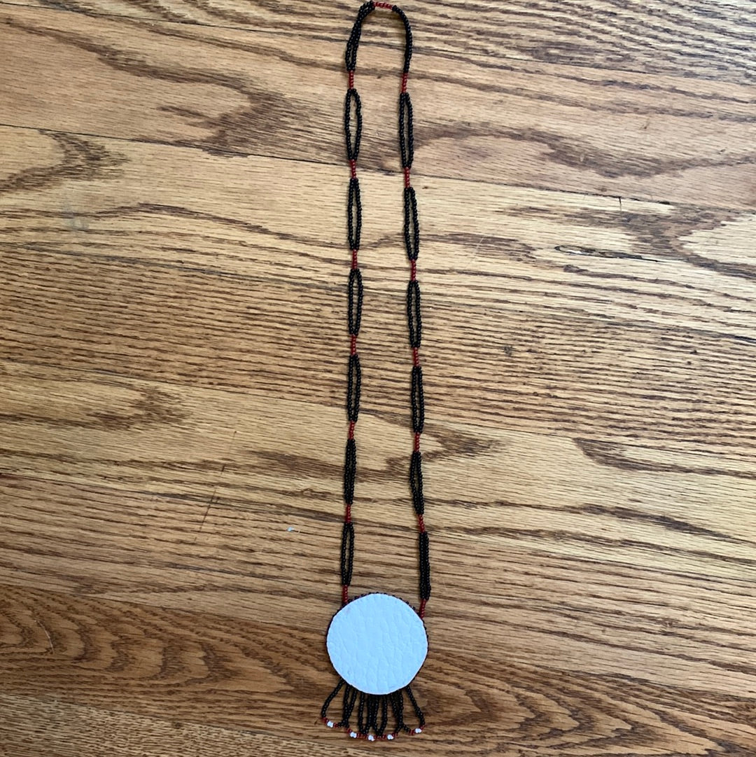 Beaded burgundy, white & black medallion necklace with fringe