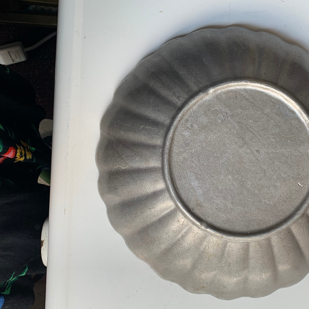 Metal scalloped edge bowl
