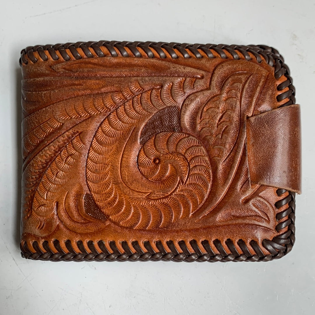 Tooled leather wallet with colorful insert
