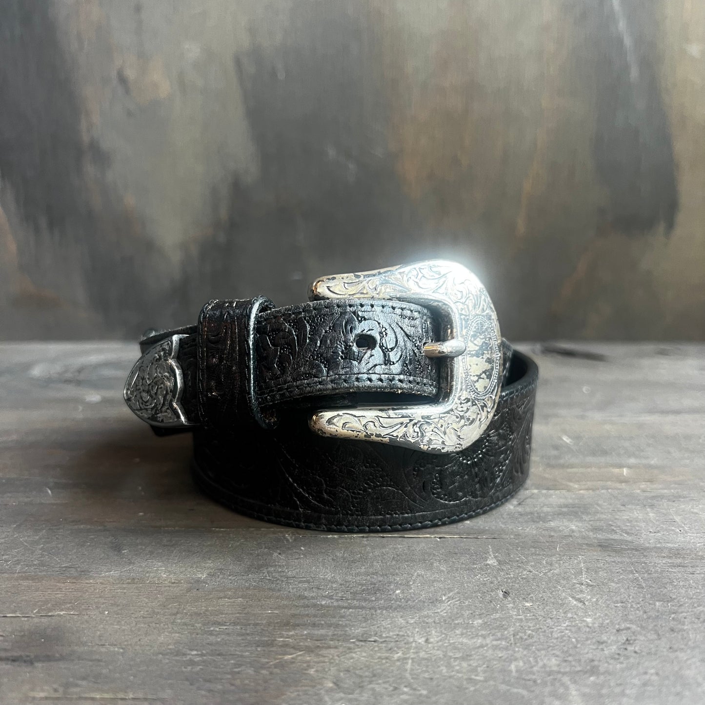 Tooled Black Leather Belt with Silver Buckle
