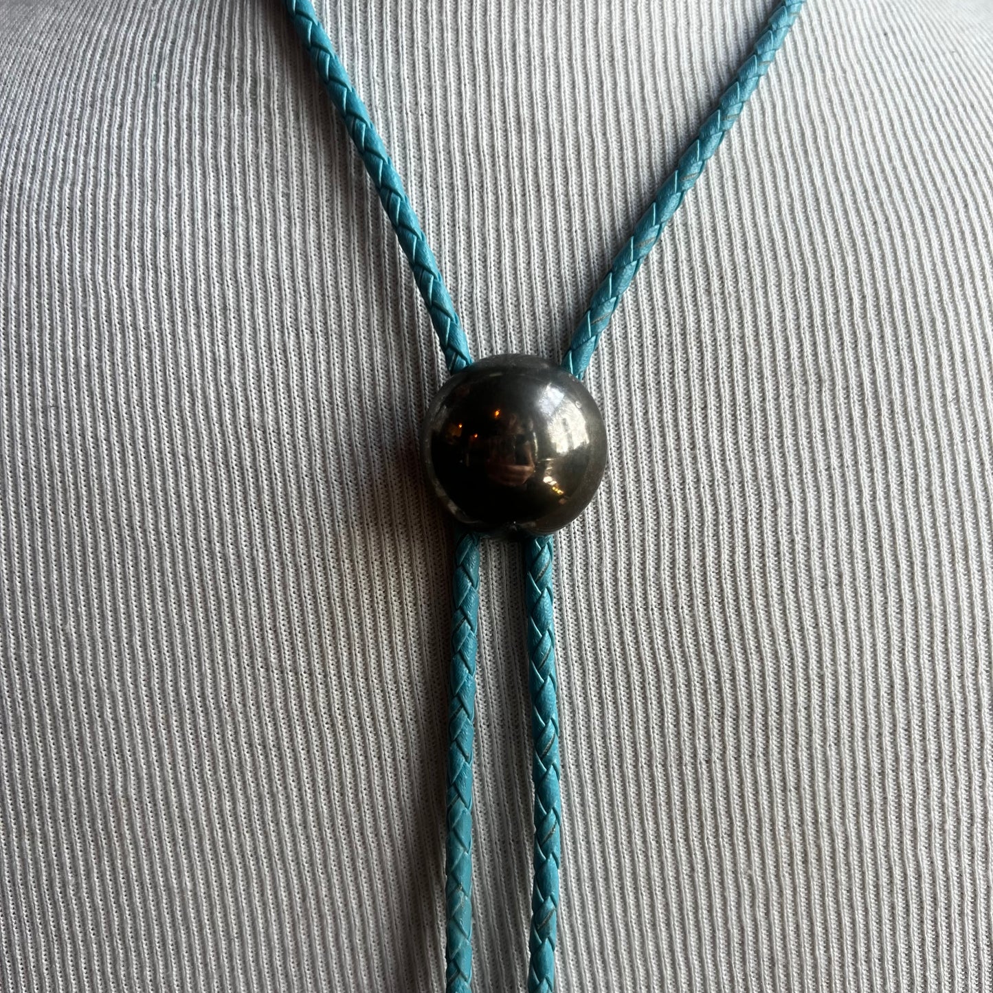 Silver Circle Bolo on Blue Cord
