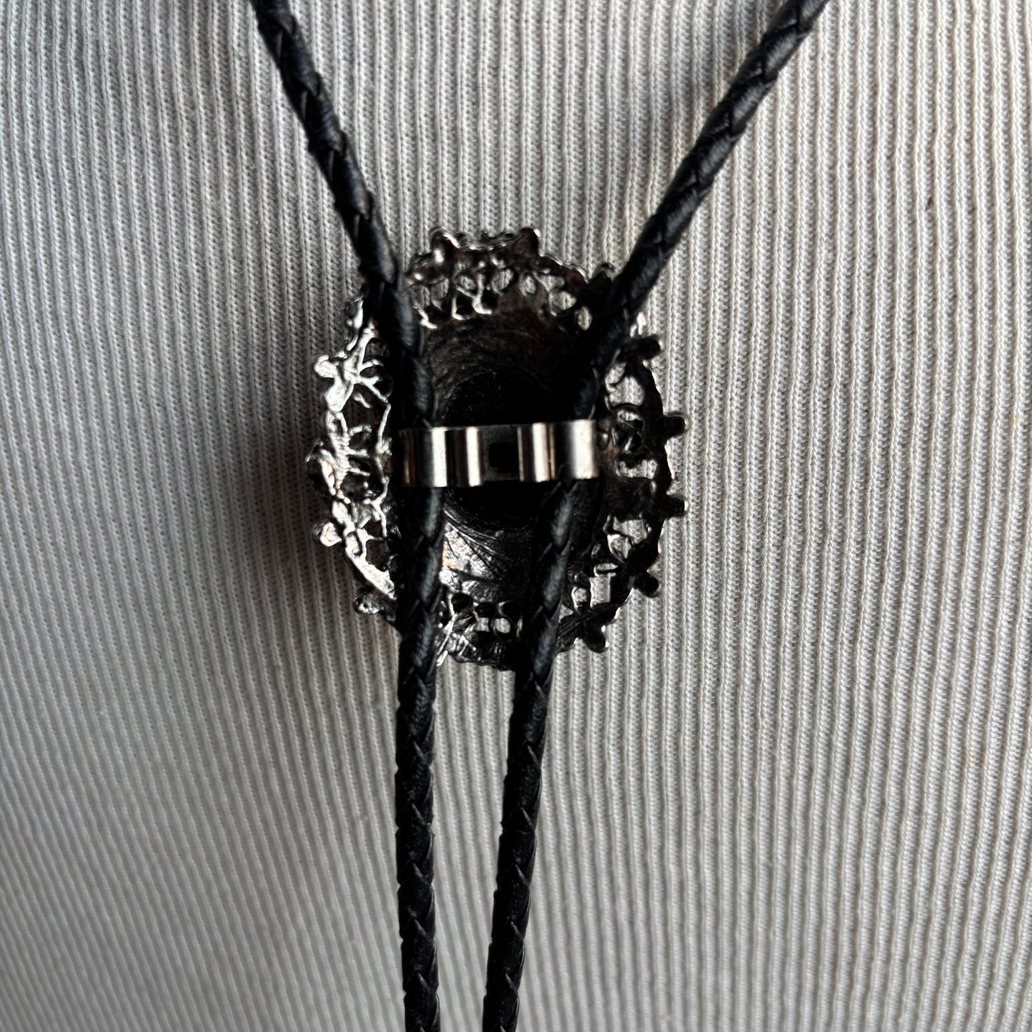 Silver Oval Bolo on Black Leather Tie