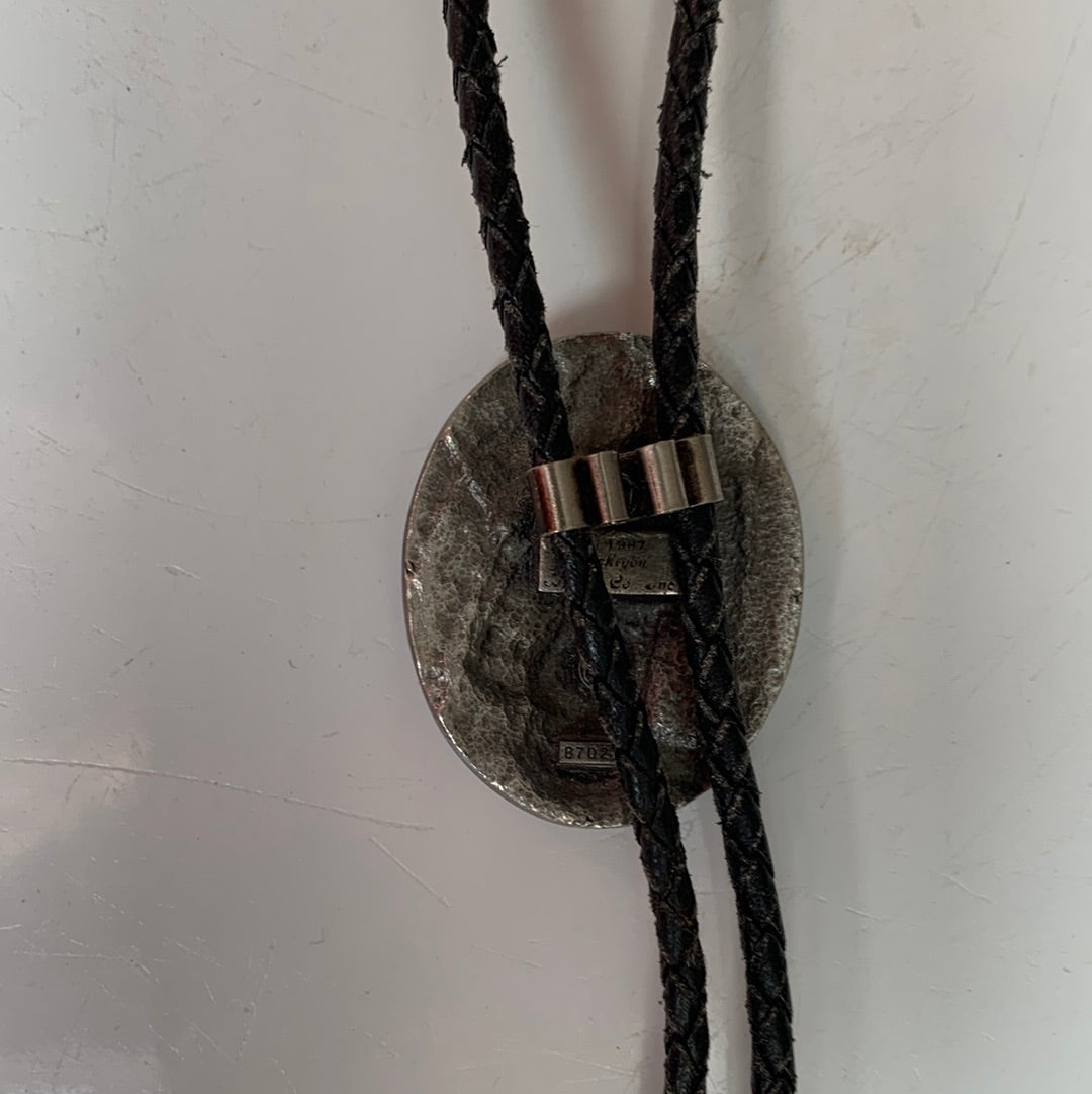 Landing eagle on turquoise enamel bolo with black leather tie