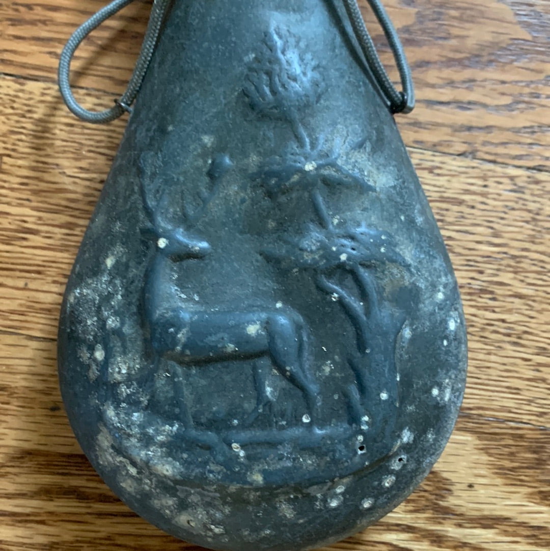 Antique powder flask with deer