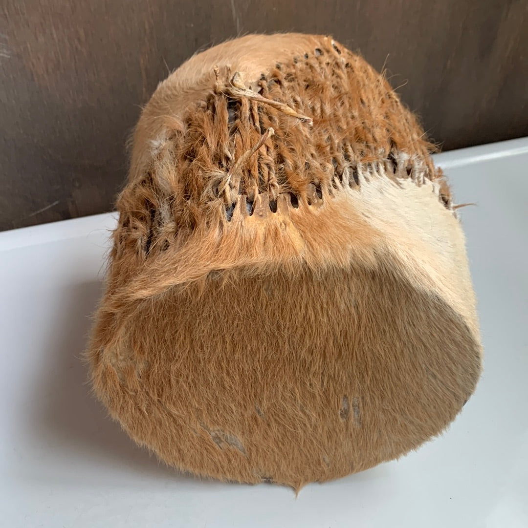 Hide covered hand drum