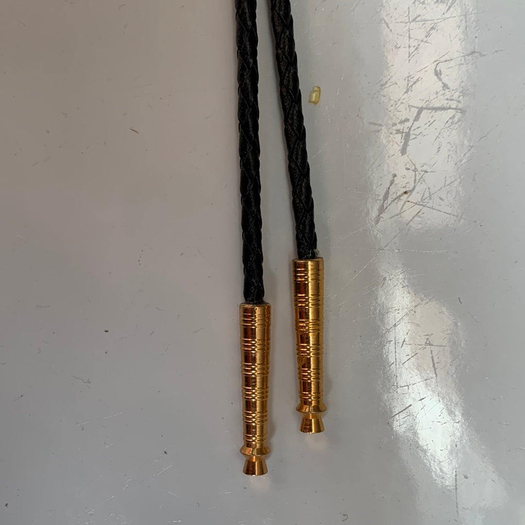 Polished red stone bolo with black leather tie