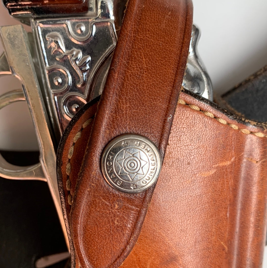 Wide black leather belt with holster (shown with water pistol)