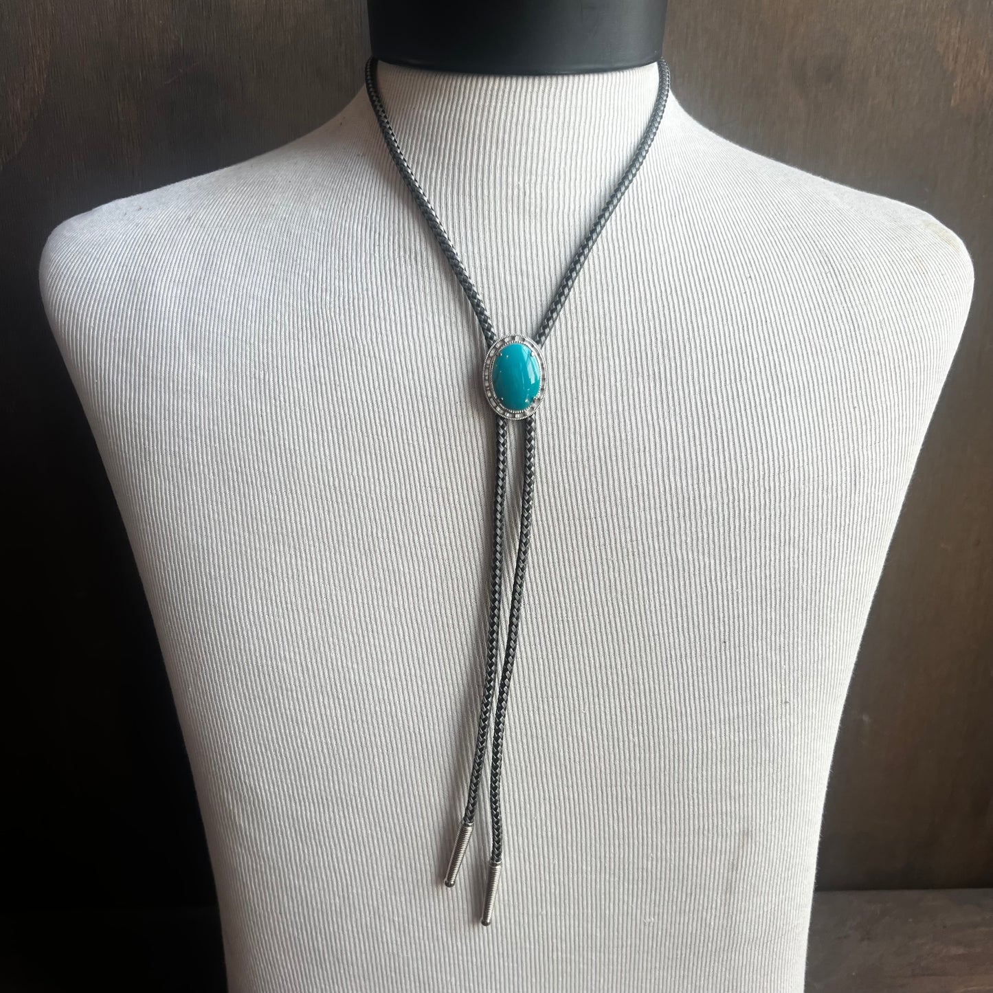 Faux Turquoise Bolo Tie on Black and White Cord
