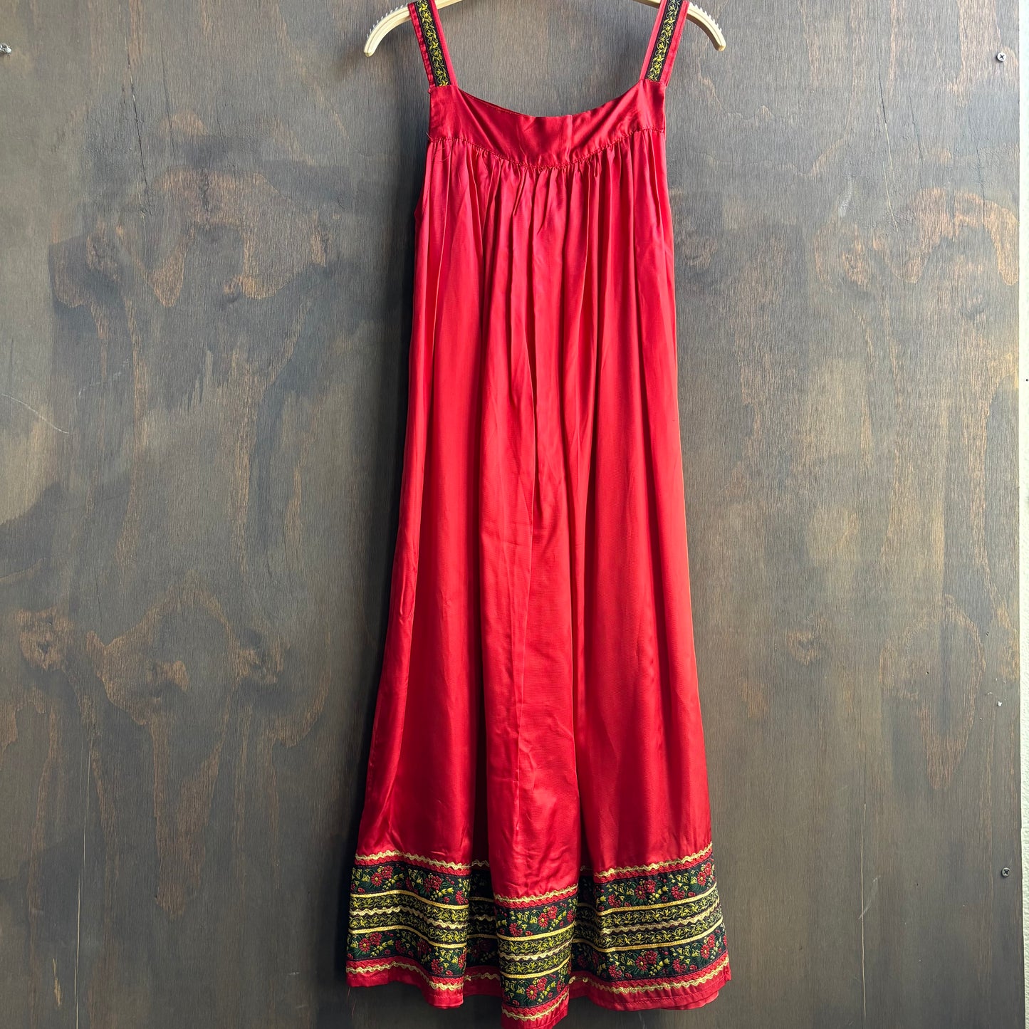Red Sleeveless Dress with Ornate Trim