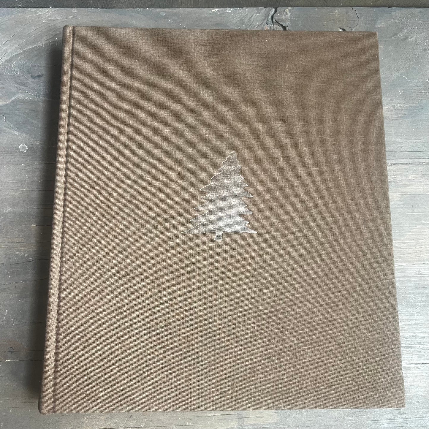 The Story of Leanin’ Tree Book