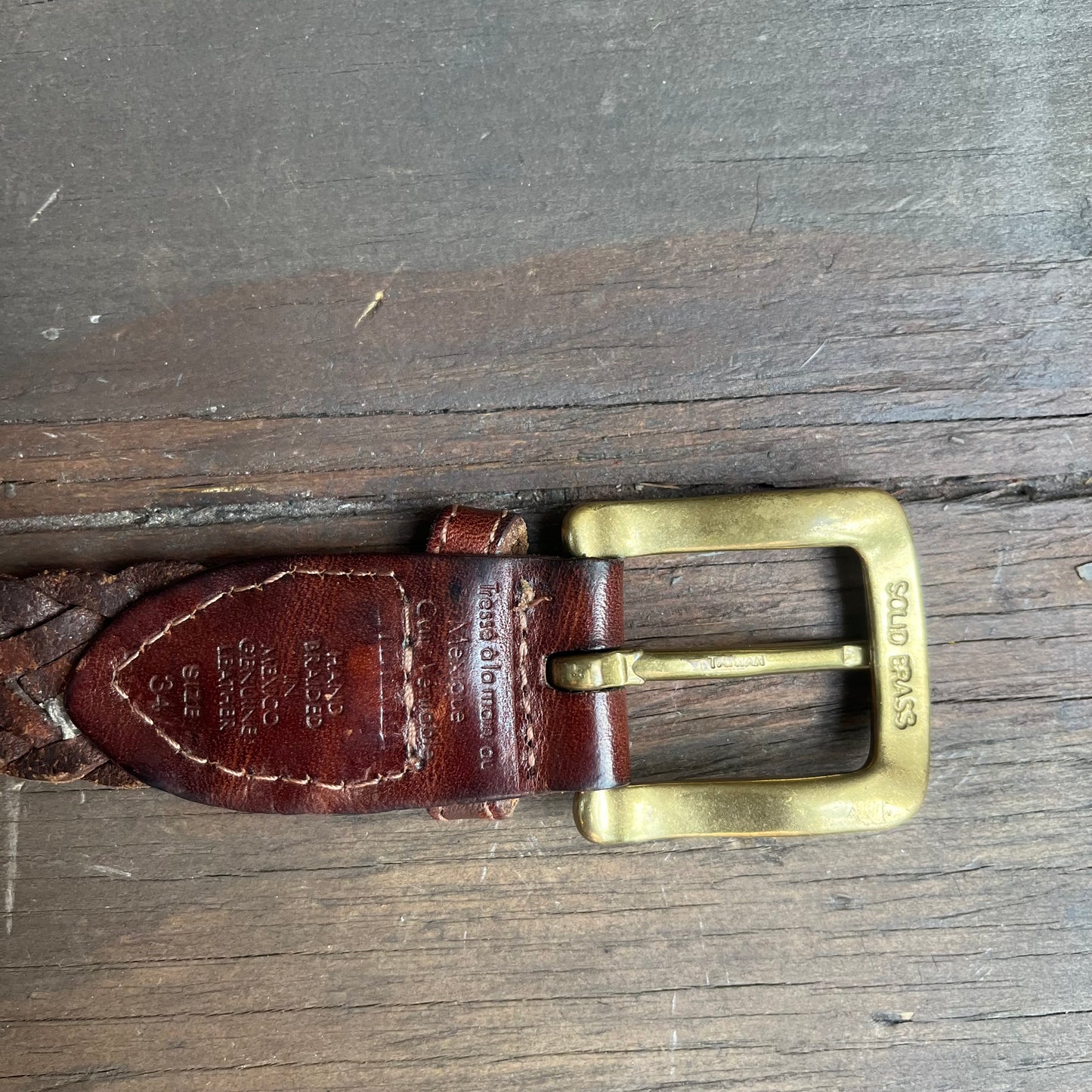 Brown braided belt with solid brass buckle