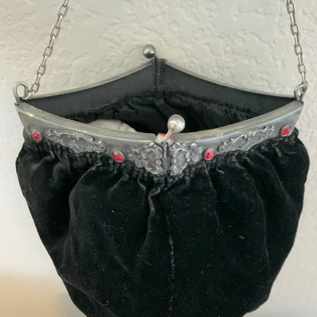 Black velvet evening bag with tassel