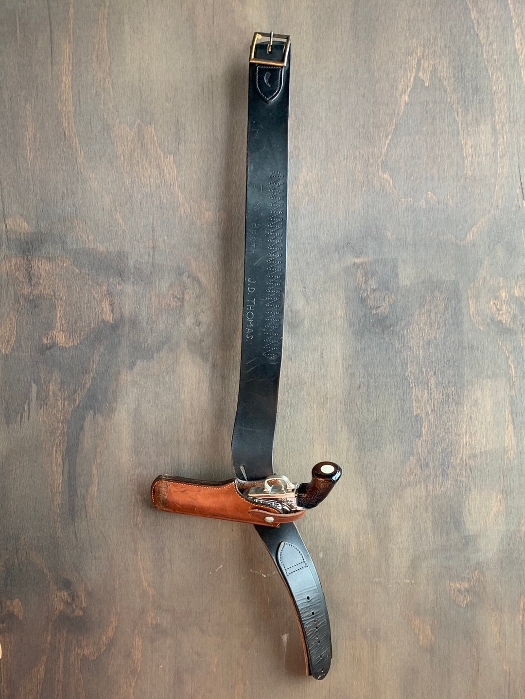 Wide black leather belt with holster (shown with water pistol)