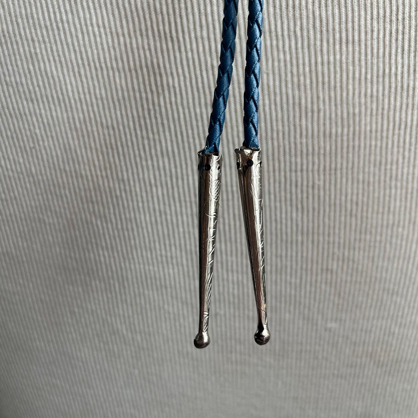 1909 Silver Dollar Bolo on Blue Tie