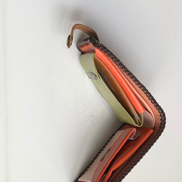 Tooled leather wallet with colorful insert