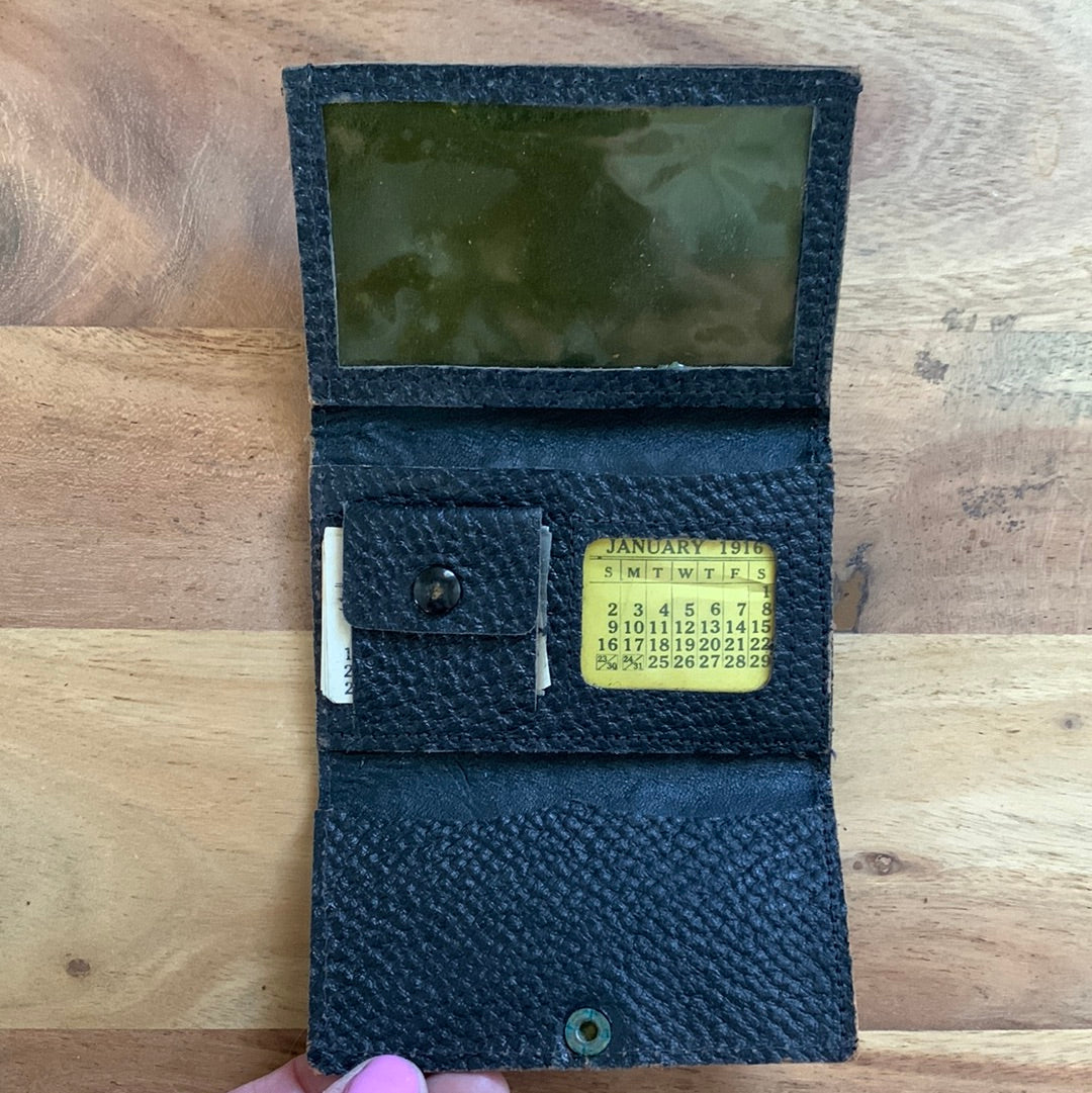 Antique leather wallet with 1916 monthly calendar