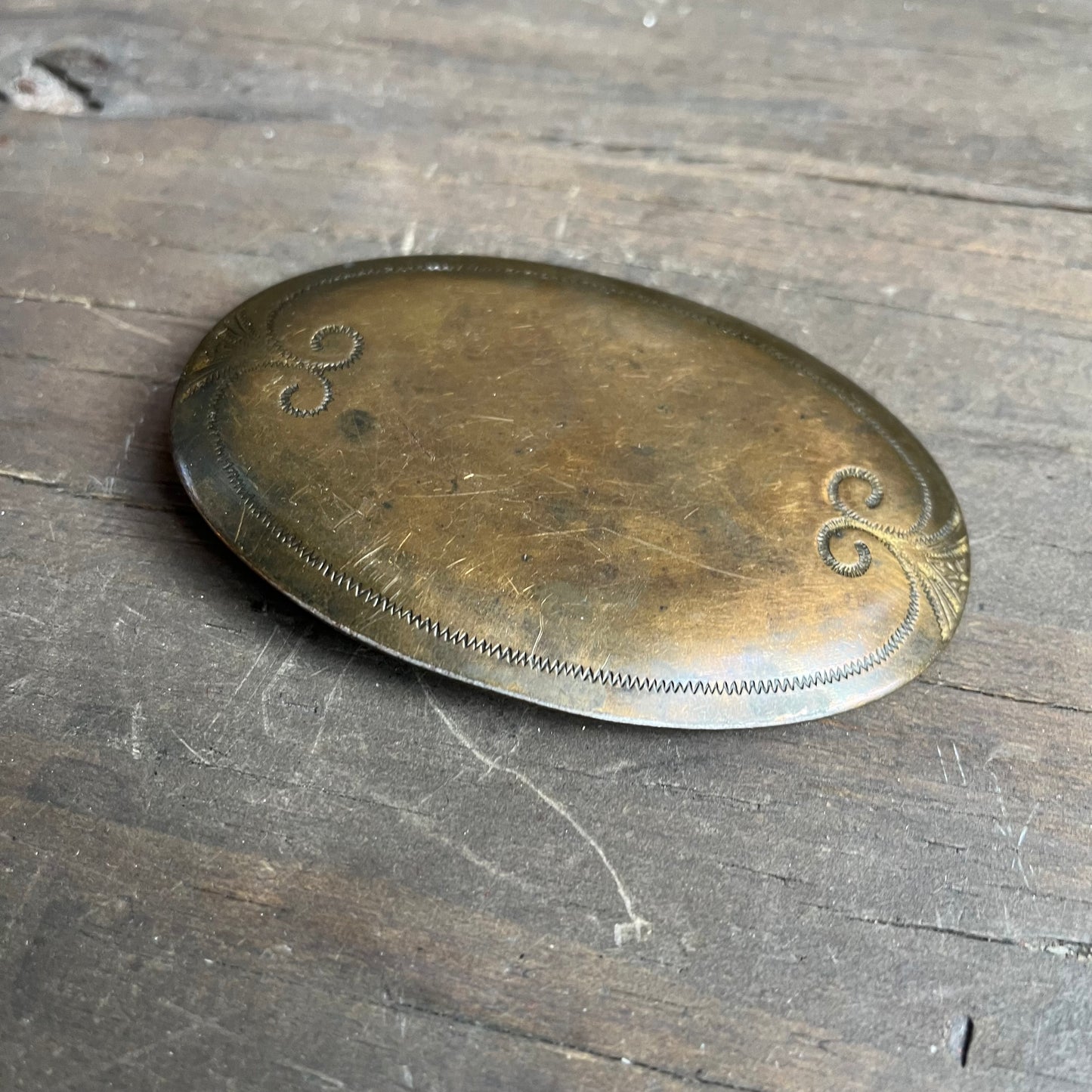 Brass tone belt buckle