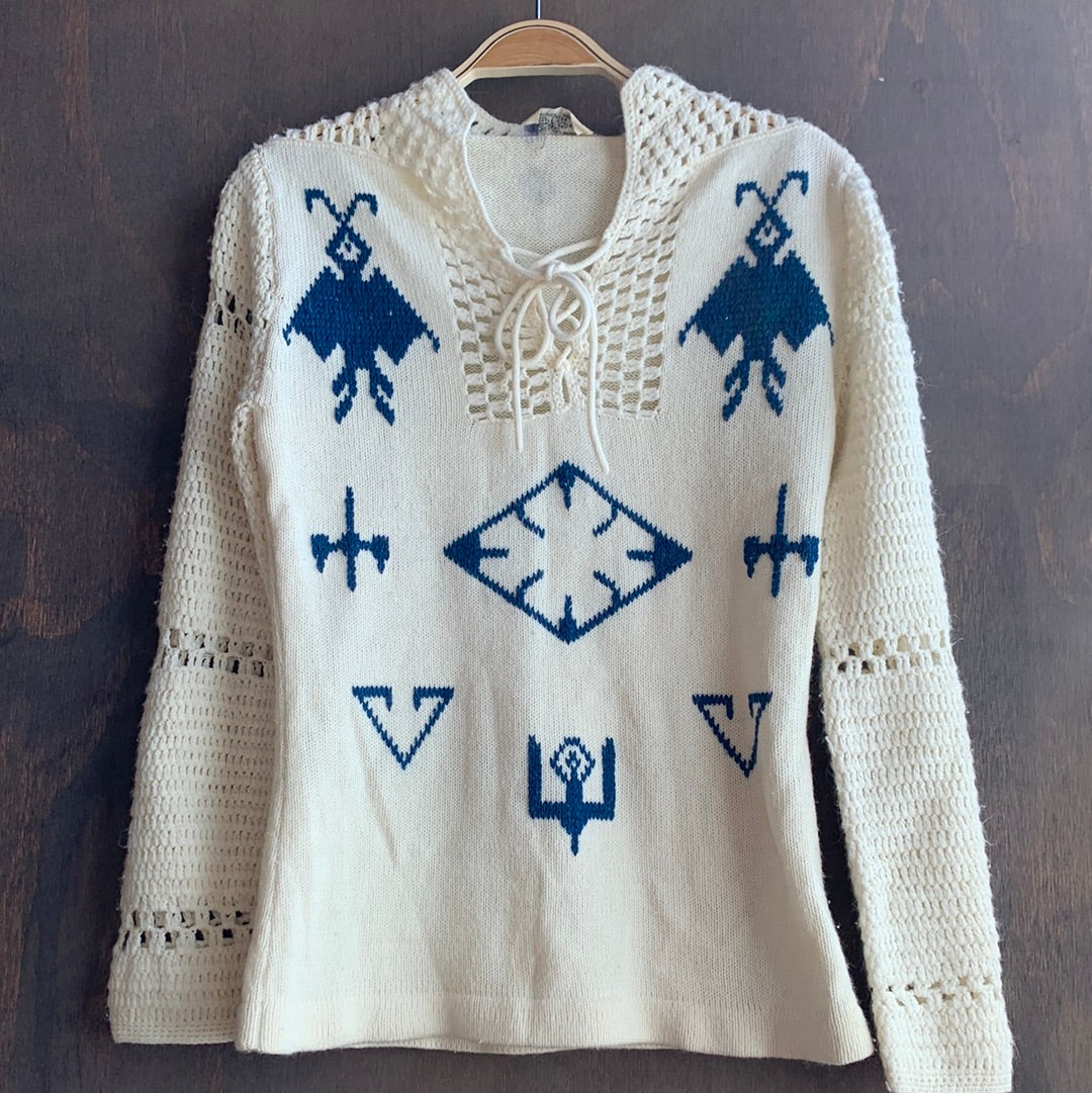 Vintage cream colored sweater with blue graphic designs