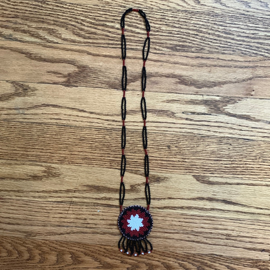 Beaded burgundy, white & black medallion necklace with fringe