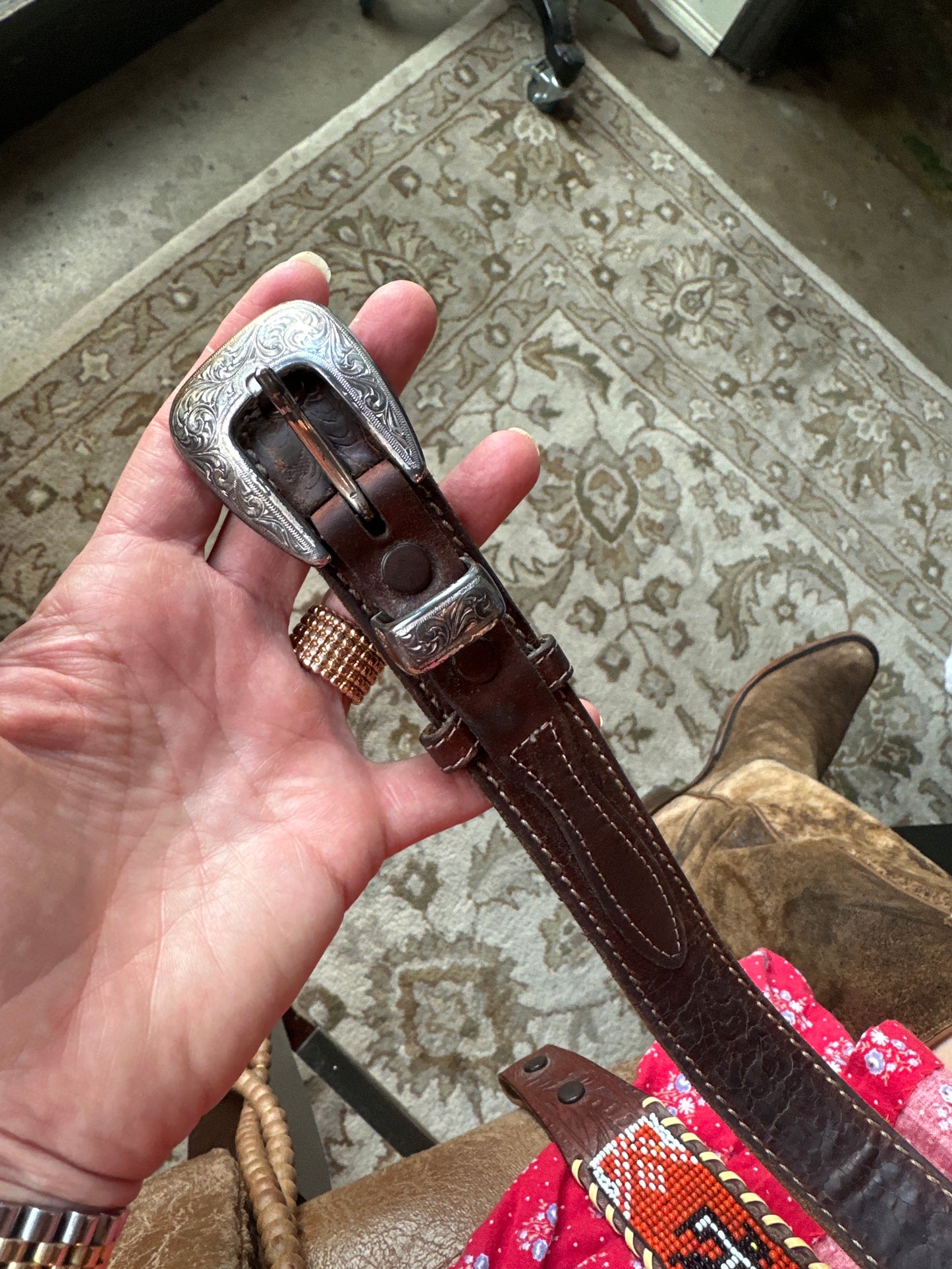 Brown Tooled Leather and Silver Belt Buckle