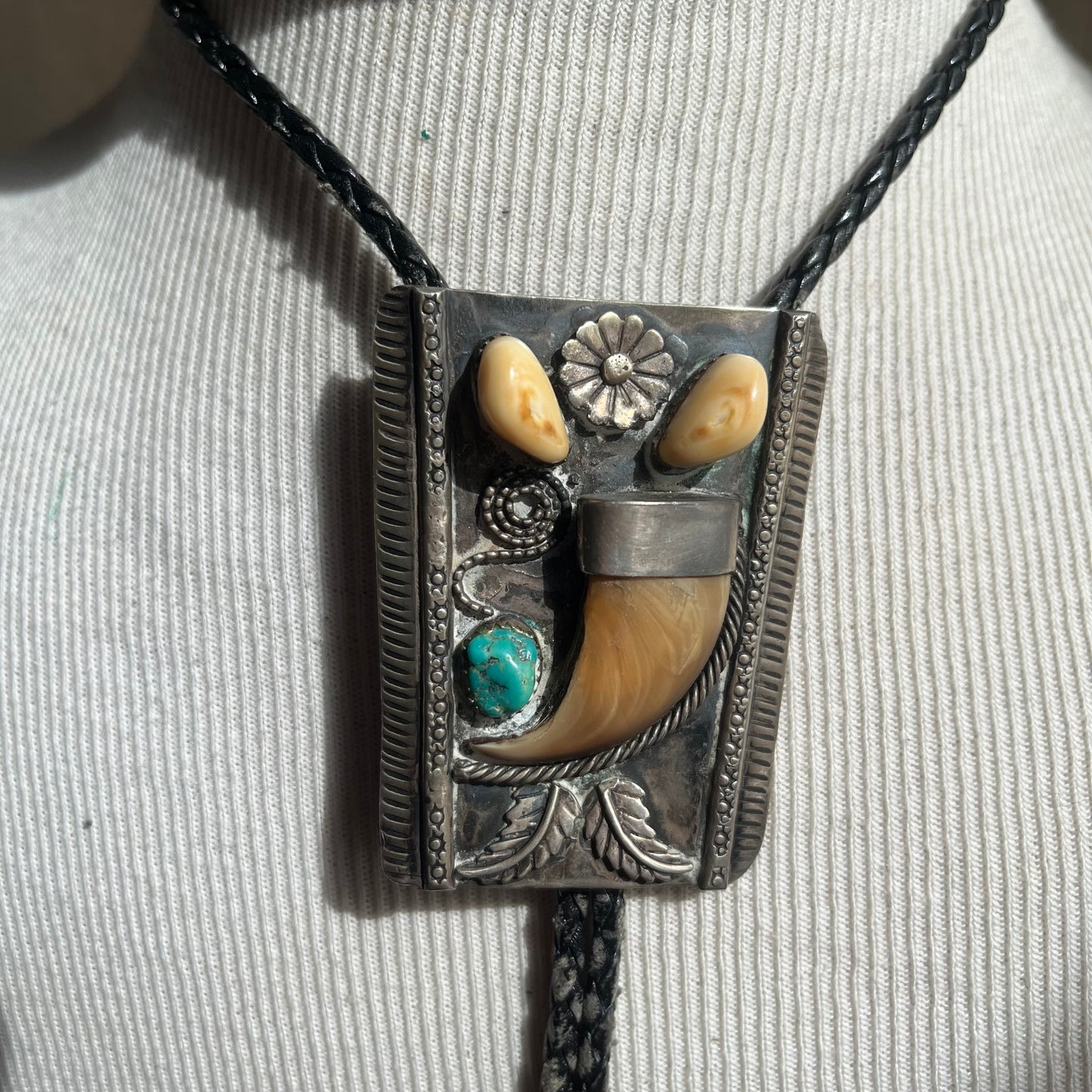 Sterling silver bear claw bolo with black tie