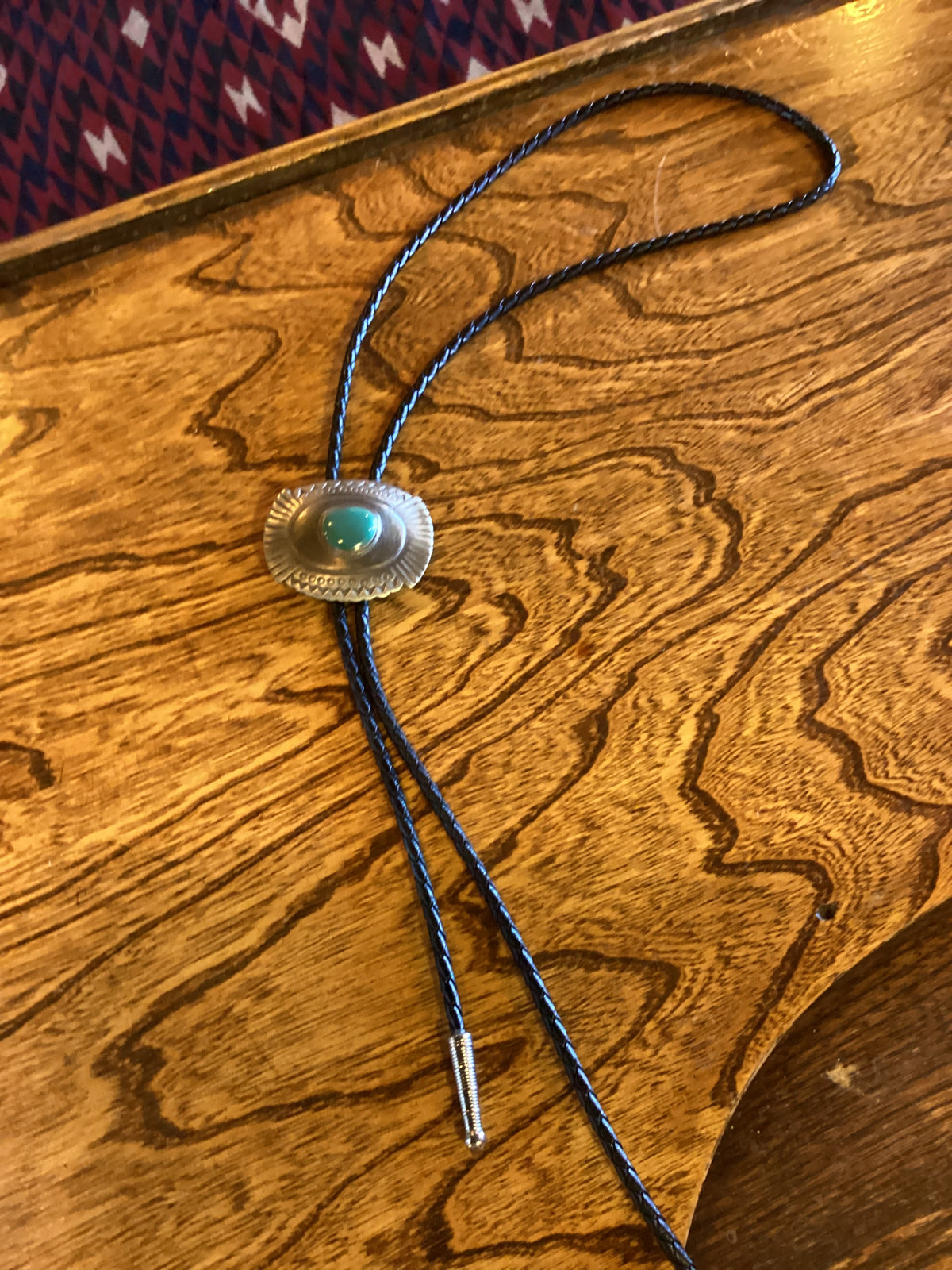 Silver bolo with turquoise color center