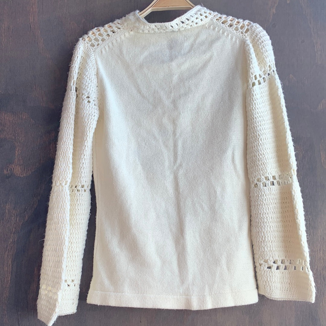 Vintage cream colored sweater with blue graphic designs