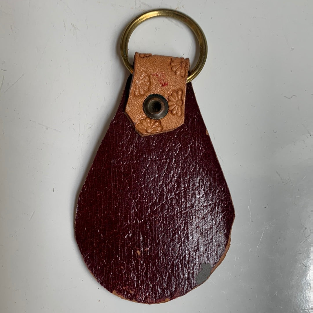 Tooled leather jumping fish key chain with flower edge