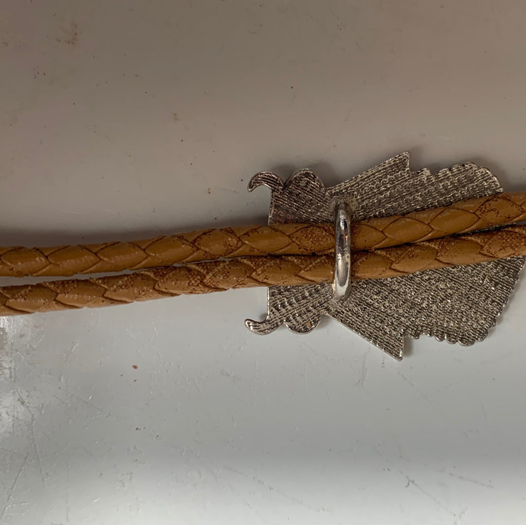 Silver decorative bolo with stone and tan leather cord