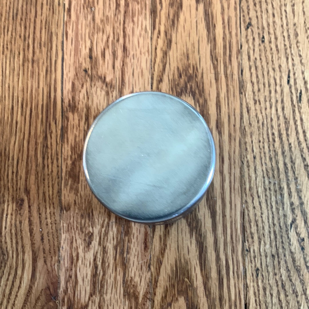 Small metal container with vase