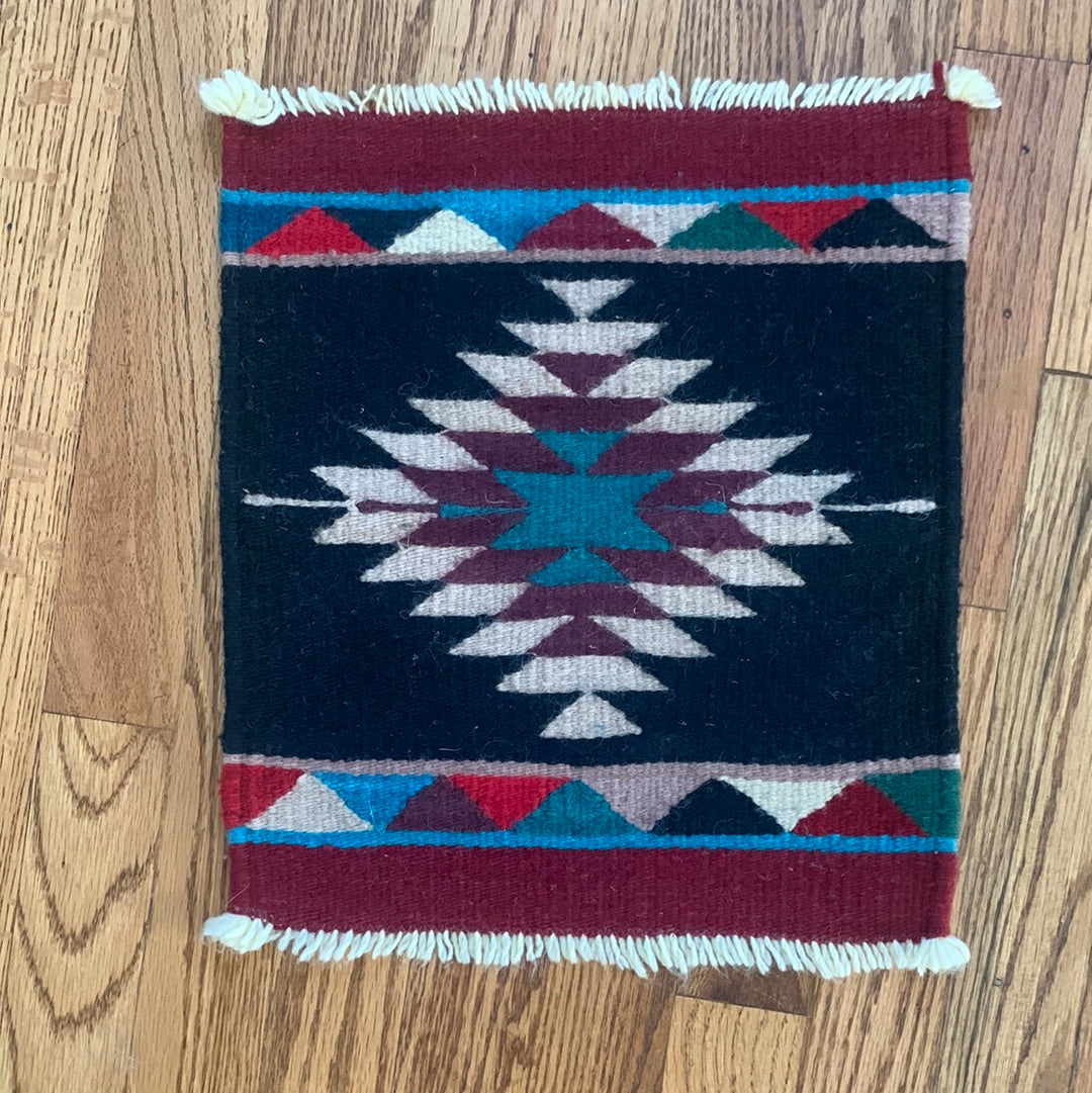 Burgundy, teal & black weaving