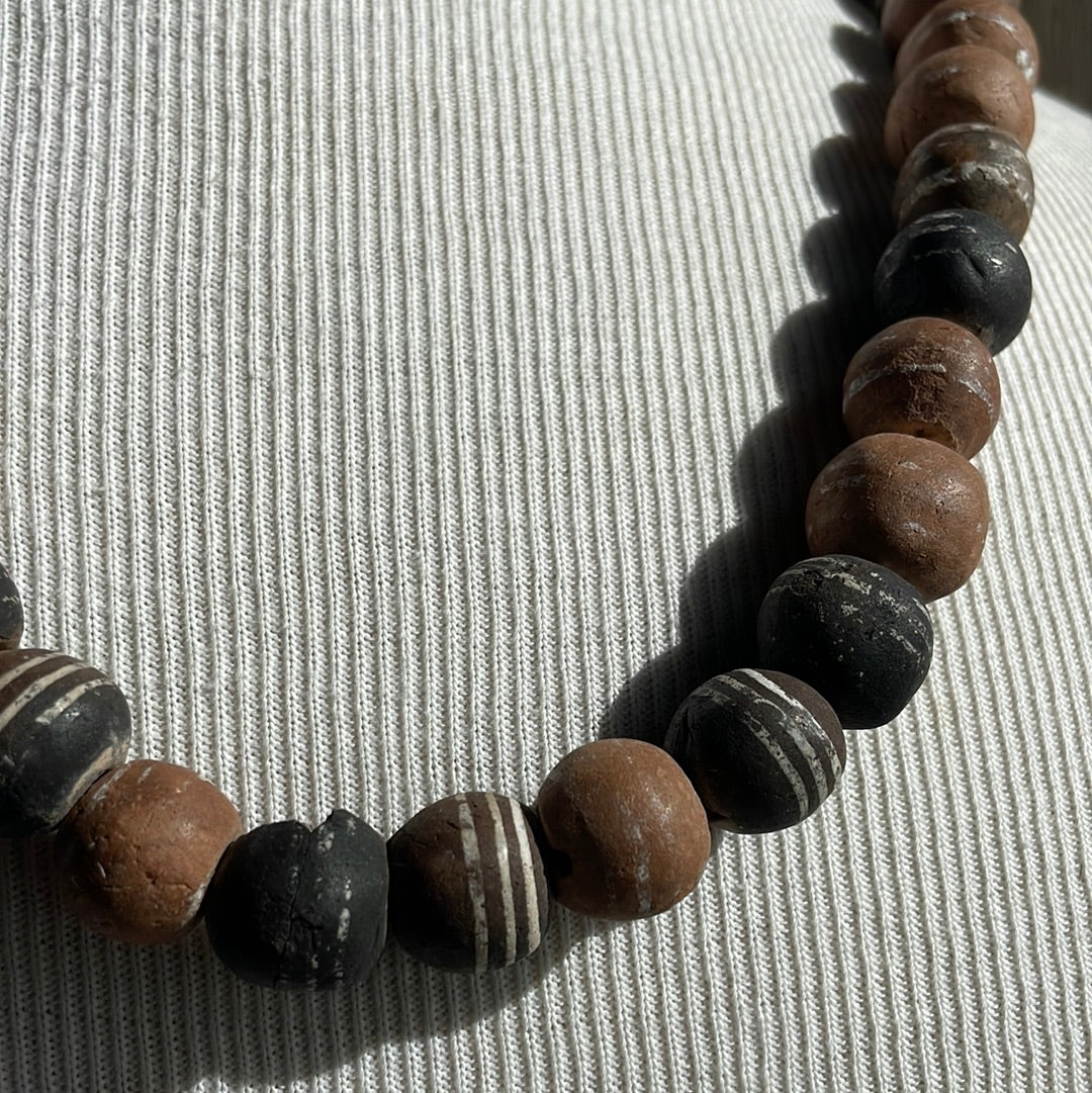 Clay bead strand necklace