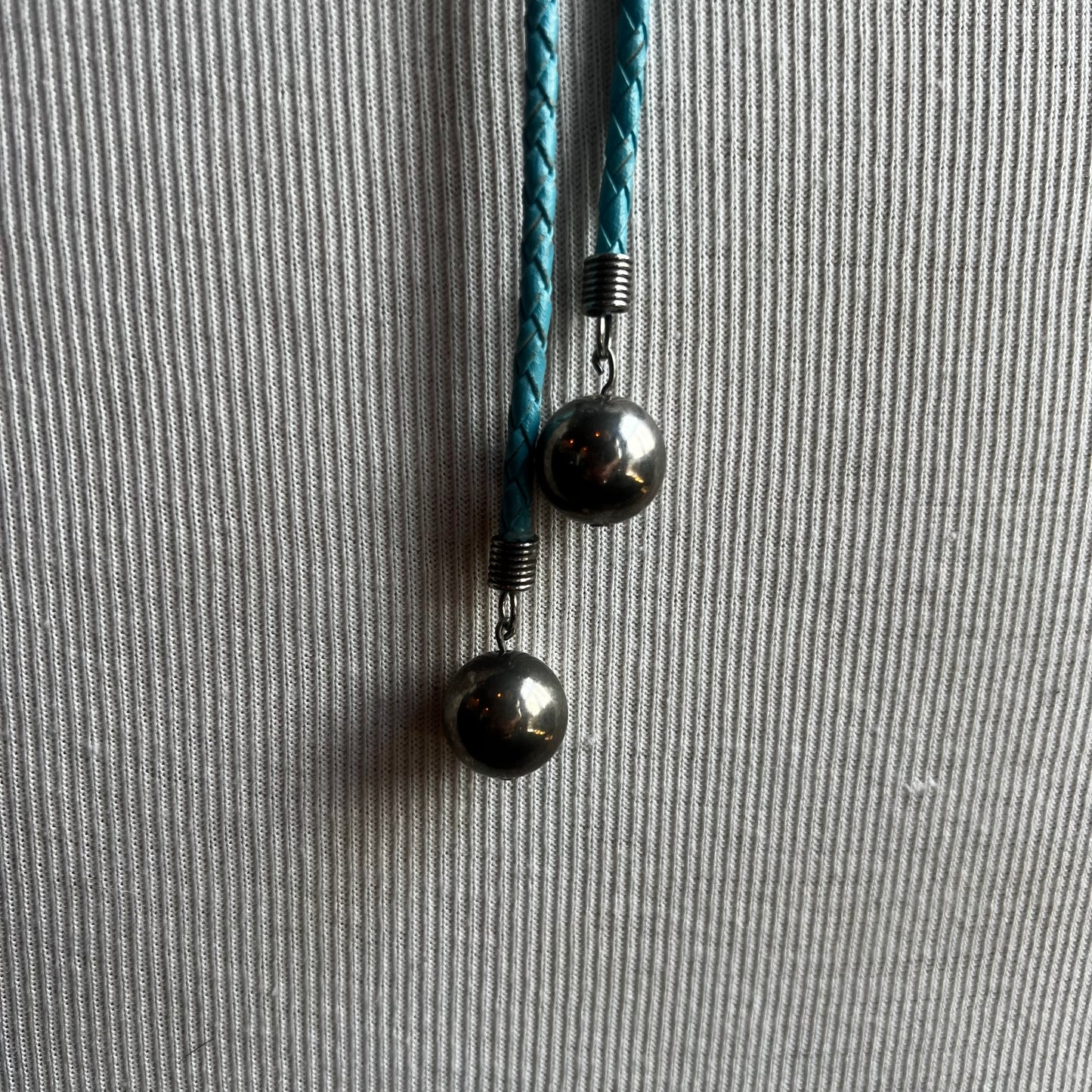 Silver Circle Bolo on Blue Cord
