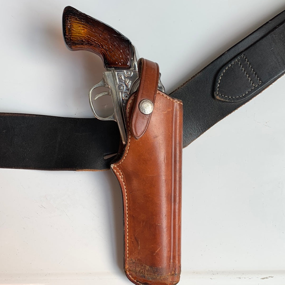 Wide black leather belt with holster (shown with water pistol)