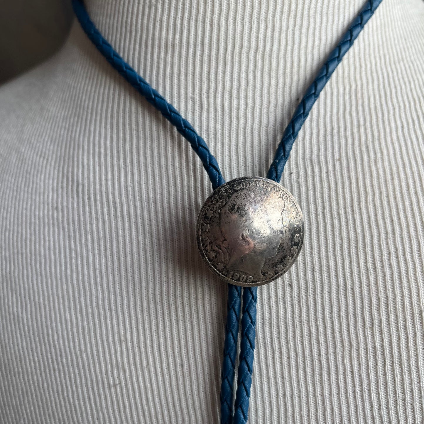1909 Silver Dollar Bolo on Blue Tie