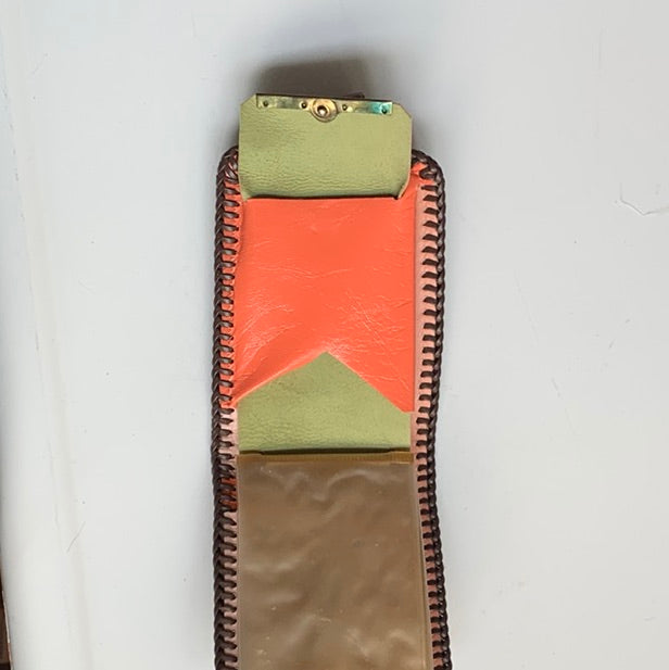 Tooled leather wallet with colorful insert