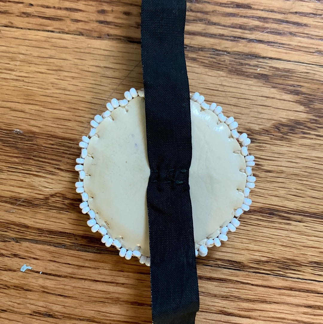 Seed bead medallion on black ribbon