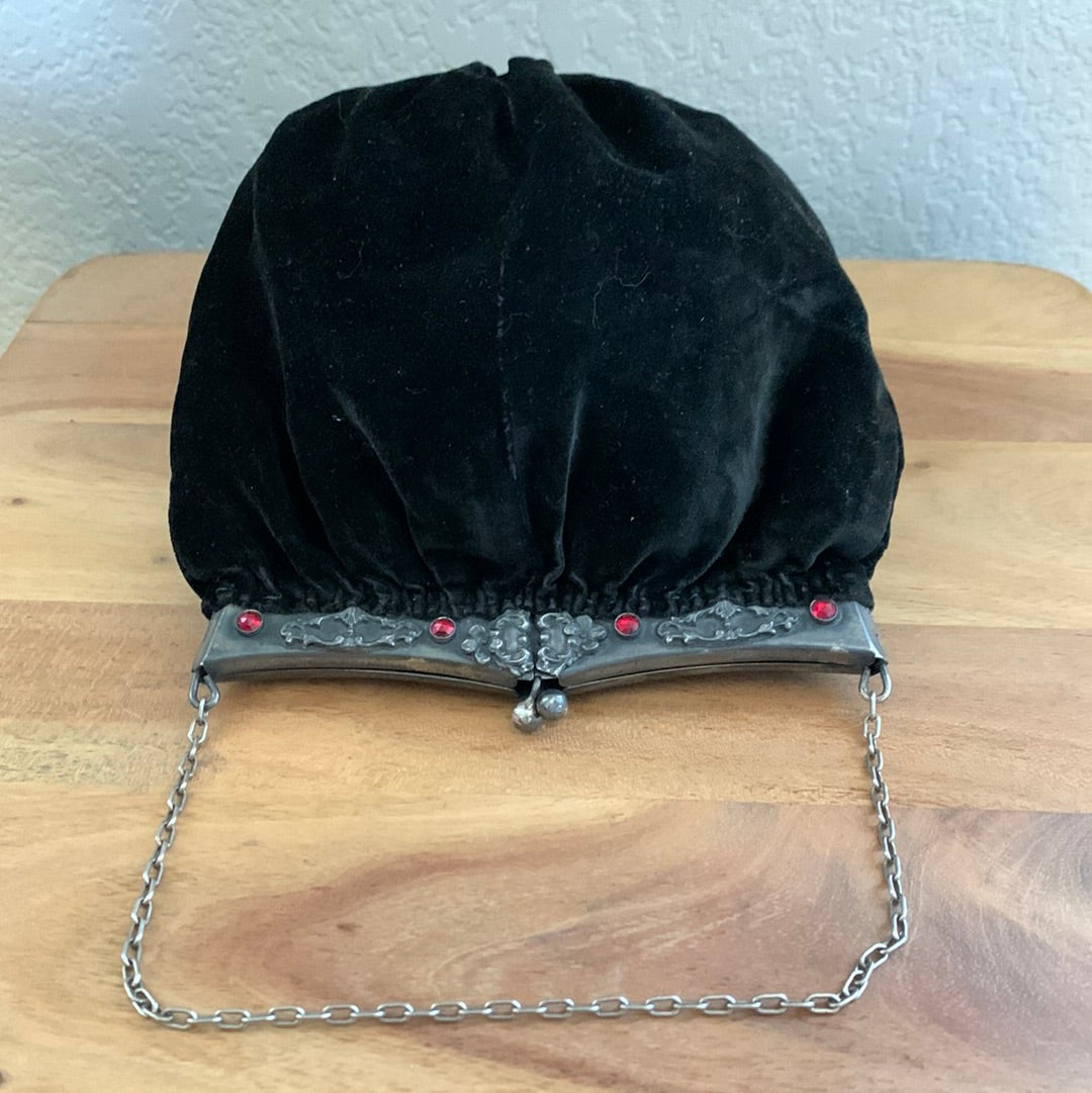 Black velvet evening bag with tassel